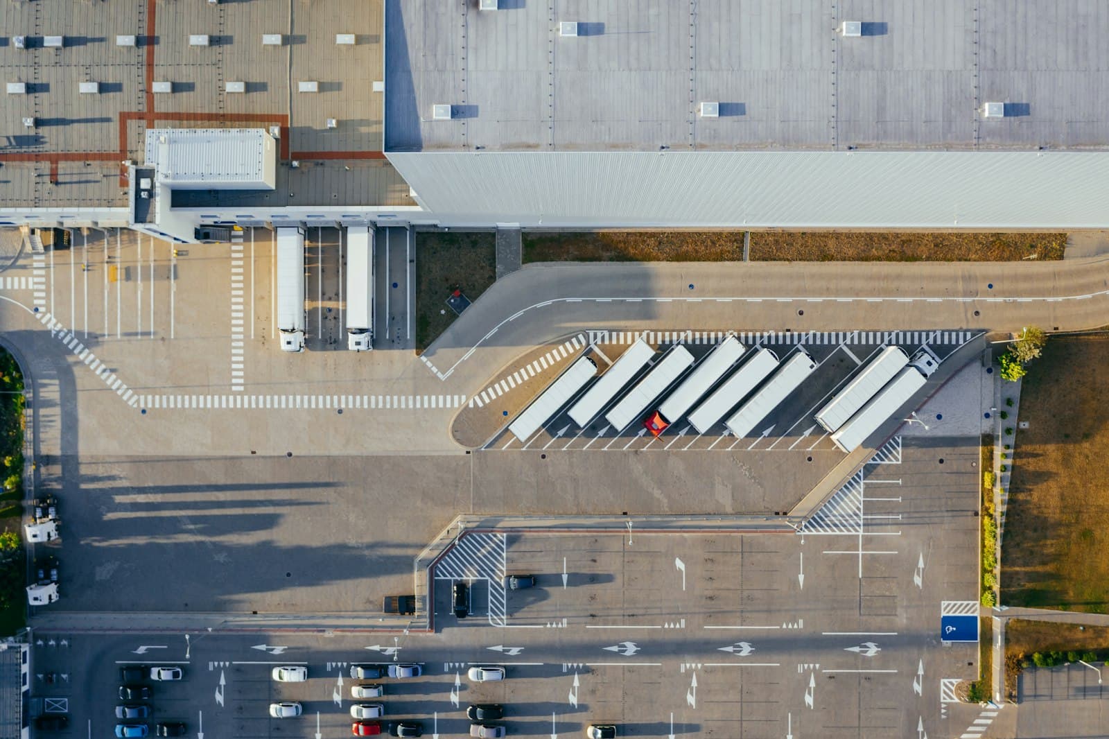 Aerial view of collection vehicles docked at a depot
